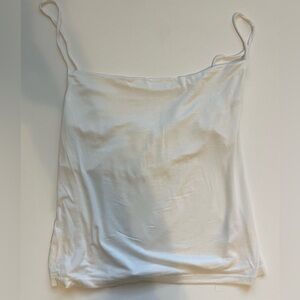 white A'made camisole with a cowl neck design and spaghetti straps